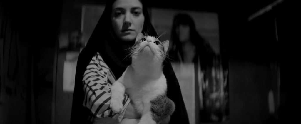 a-girl-walks-home-alone-at-night-34